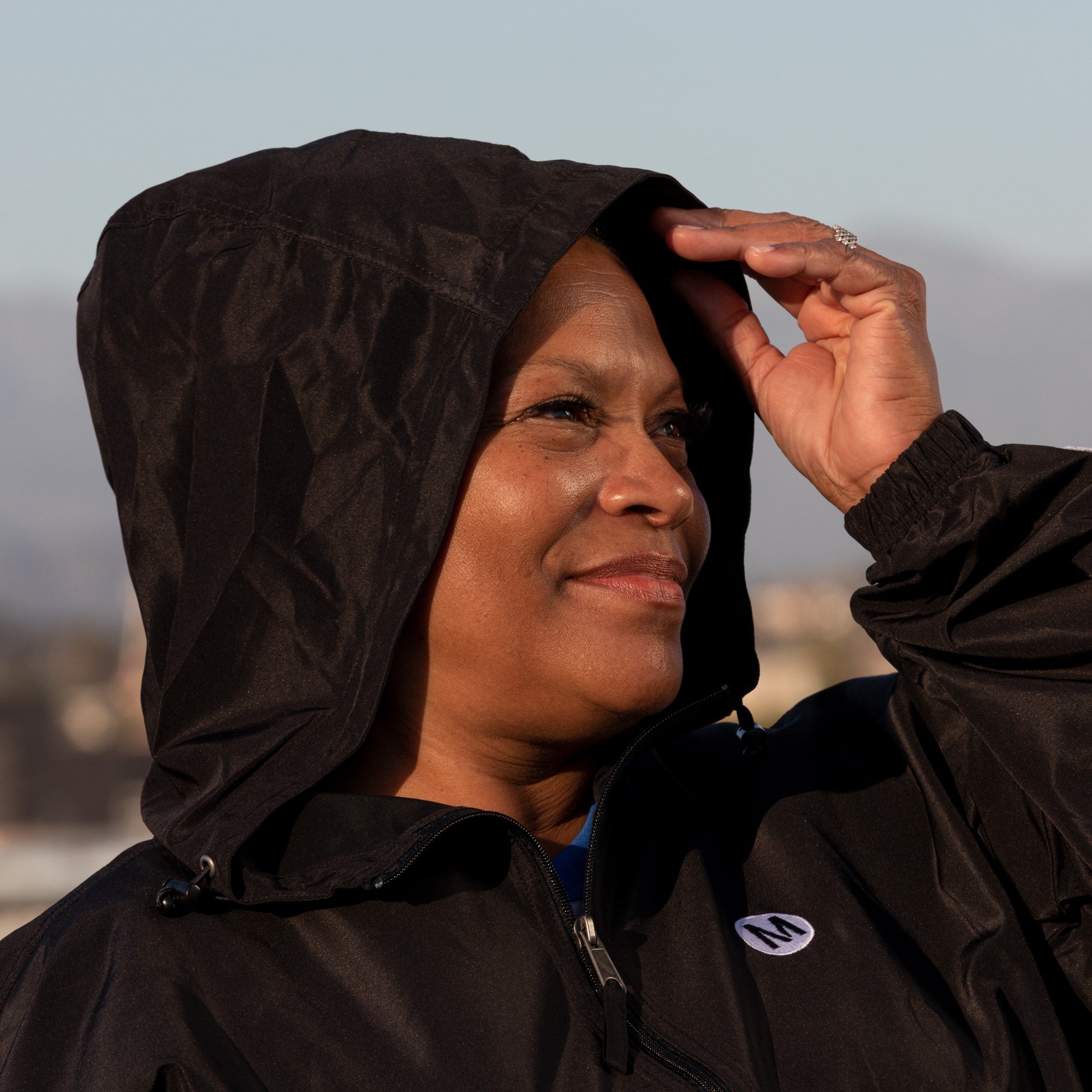 Woman shop within windbreaker